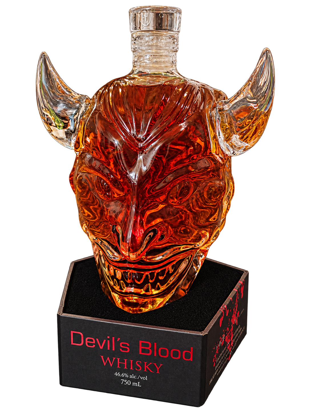 Devil’s Blood Whiskey in a horned glass devil-head bottle, on its black presentation box